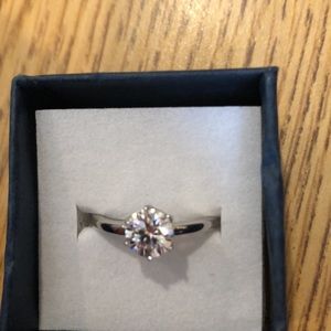1 carat Diamond ring if interested please send me a shipping label